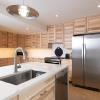 What once was a cramped, dark kitchen and dining area is now an expansive eat-in kitchen with plenty of storage and counter space.